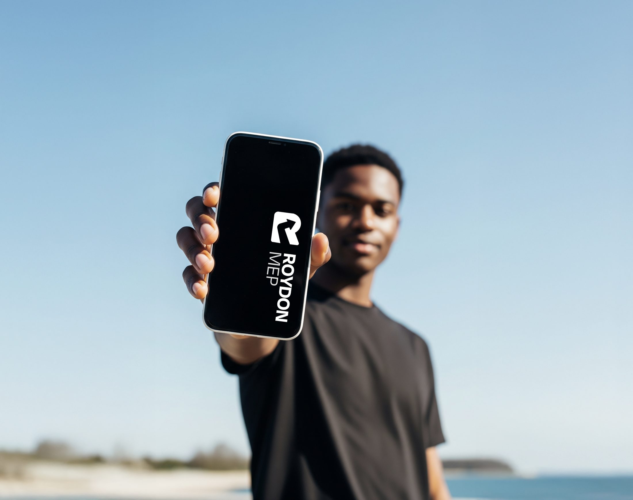 Roydon MEP — mobile app mark in hand